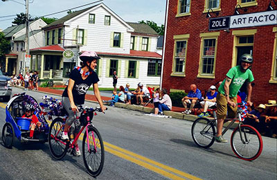 Barebones Bikes Riding Strasburg Parade See us in the Strasburg Parade